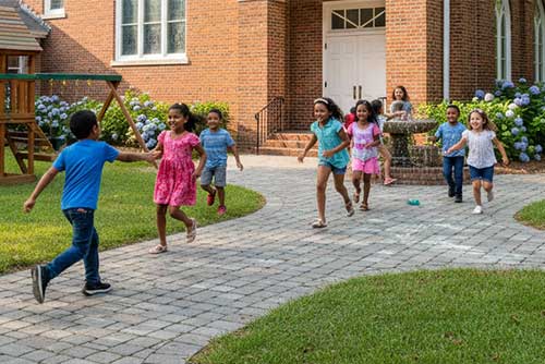 Happy children playing and learning in a safe